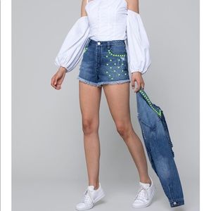 Bebe studded neon cut off jean shorts NWT